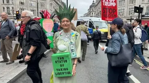 Numerous Protesters Assemble in Heart of London to Denounce President Trump's Official UK Trip